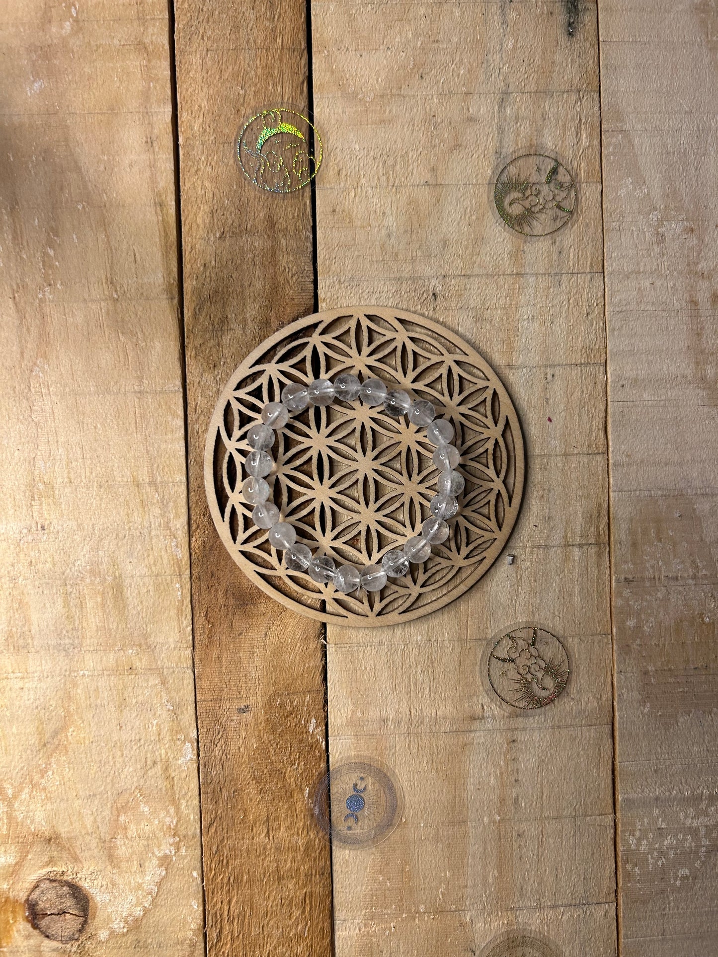 Symbole Fleur de Vie gravé sur plaque en bois pour harmonisation des énergies