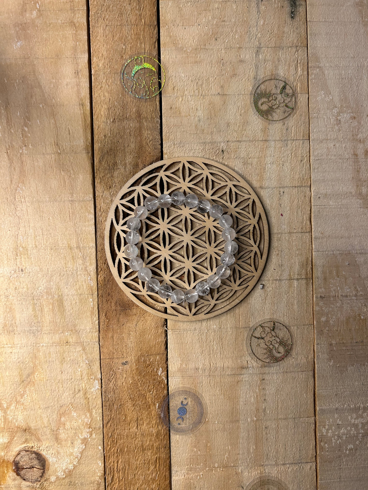 Symbole Fleur de Vie gravé sur plaque en bois pour harmonisation des énergies